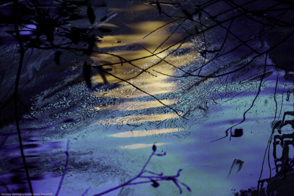 evening shades and mottled transparencies of light reflections on blue